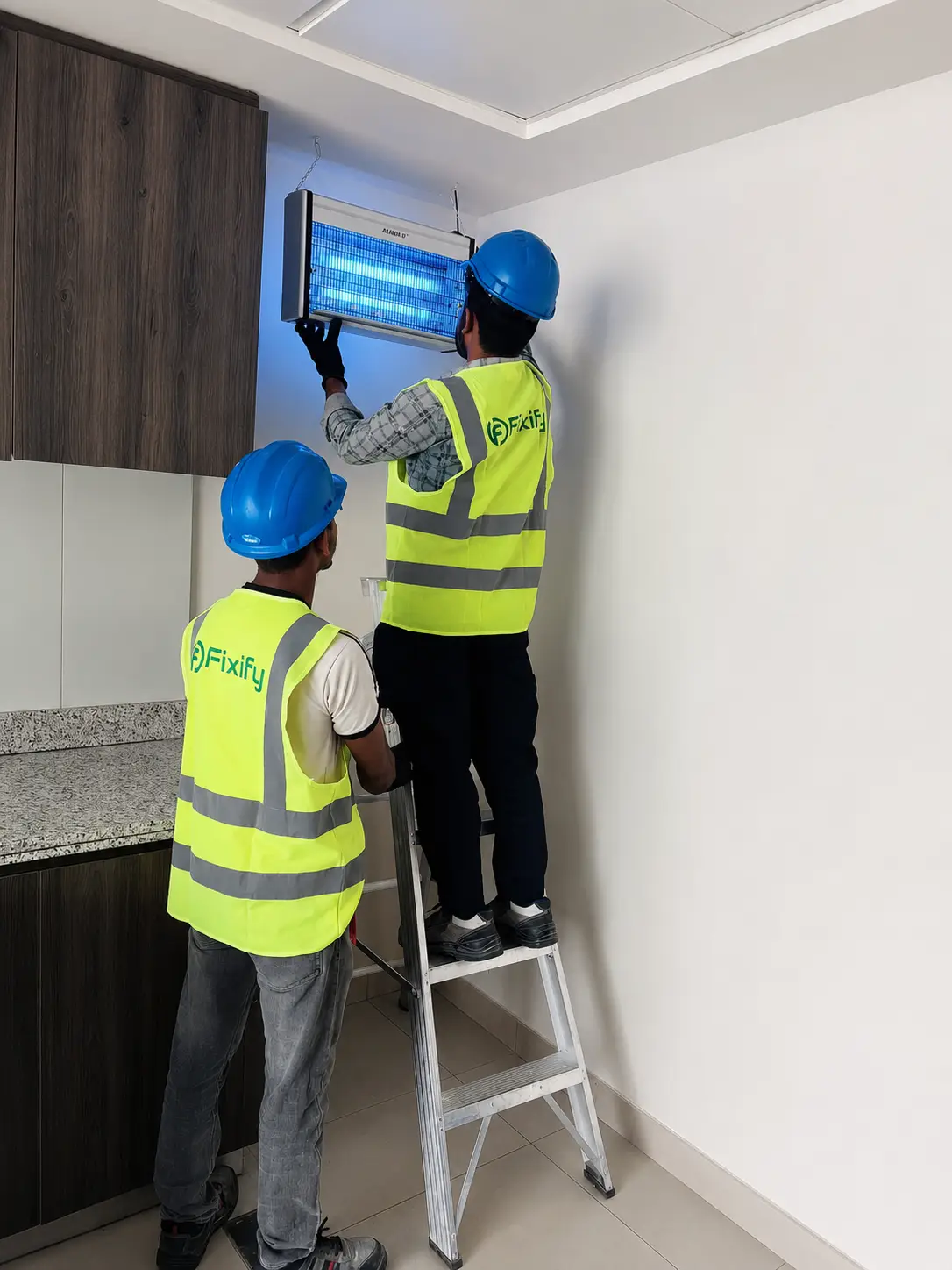 Fixify technician fixing a property solution in Abu Dhabi